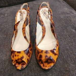 Leopord print peep toe heels from Gucci in a size 8 1/2